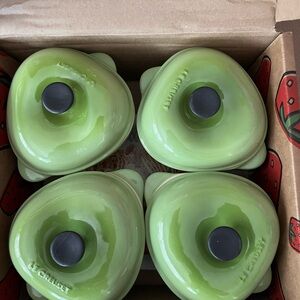 Le Creuset - set of 4 baking dishes. Just about brand new! Interesting shape.,